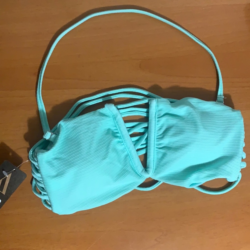 Cute bikini top with tag